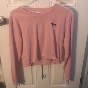 A pink long sleeve shirt